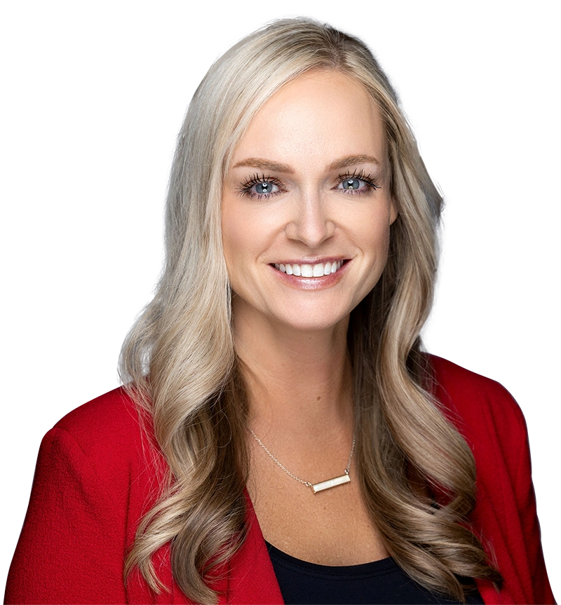 Smiling woman with long blonde hair in a red blazer.